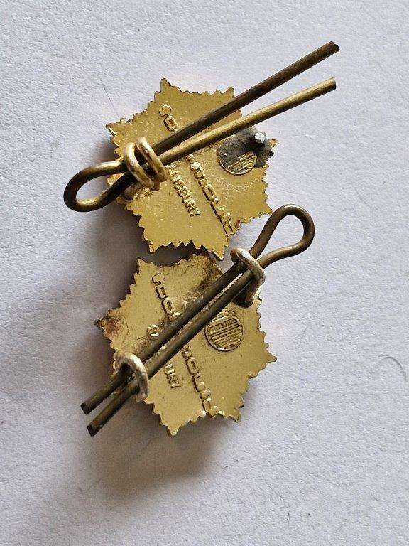 Rhodesian Army Service Corps collar badges. One lug broken.