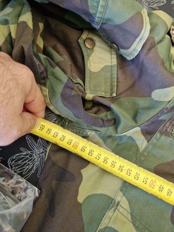 Unknown Camo Jacket with leather Commando Title. 62 Cm Armpit to armpit. Zip broken.