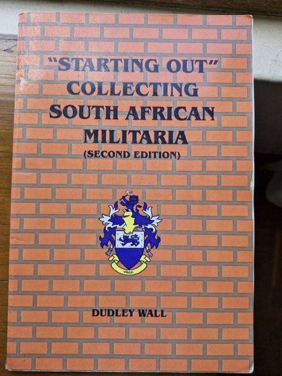 Book, "Starting Out" Collecting South African Militaria by Dudley Wall. Spine broken and pages loose
