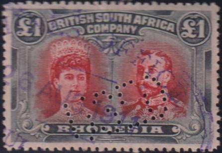 RHODESIA 1910 £1 DOUBLE HEAD VERY FINE FISCALLY USED WITH PERFIN