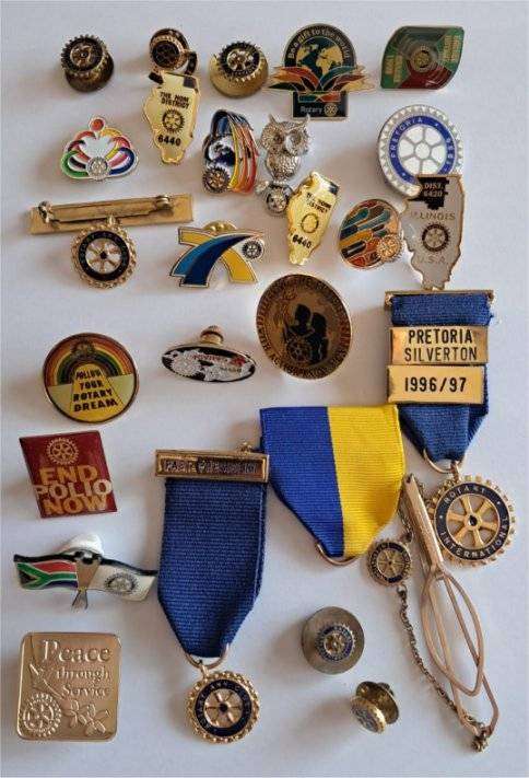 Collection Of Rotary Paul Harris Fellow Badges, Medals, and more.
