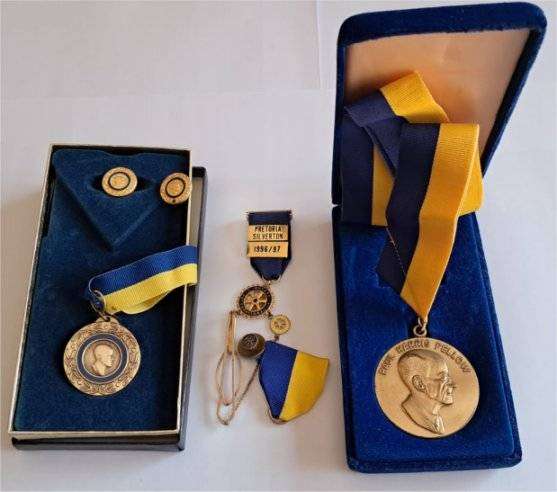Collection Of Rotary Paul Harris Fellow Badges, Medals, and more.