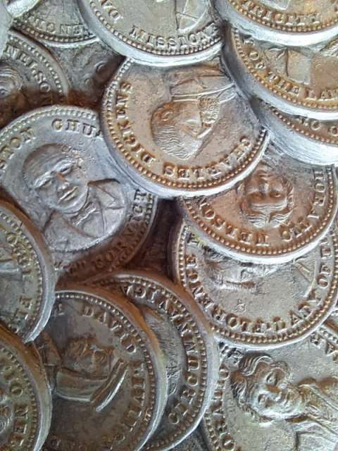 Beautiful antique paperweight in the shape of a cluster of coins