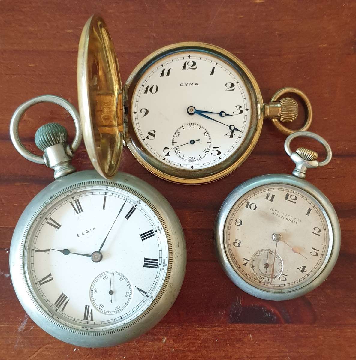 Trio Pocket watches (damaged / not working) Elgin, Cyma and Elka watch co.