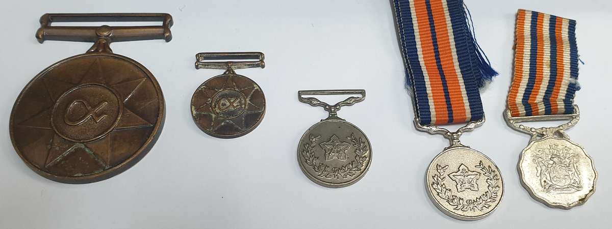 Collection of 4 SADF medals - 1 regular and 3 miniatures