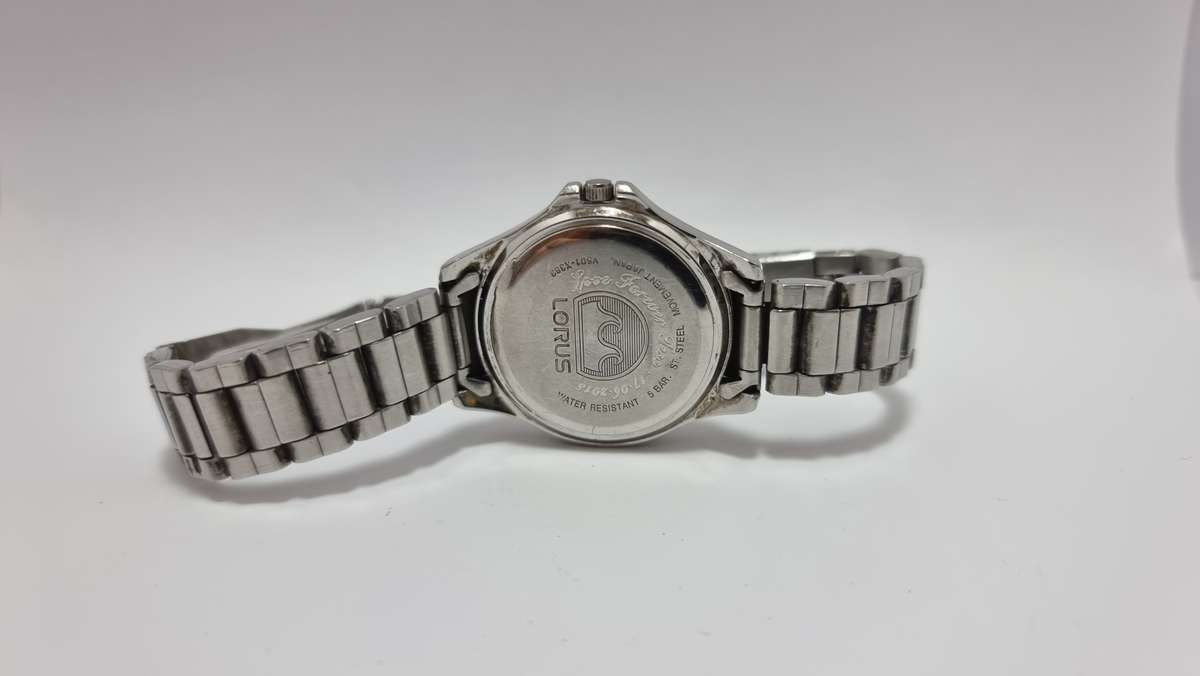 Lorus stainless steel watch V501-X383 (for parts/repair)