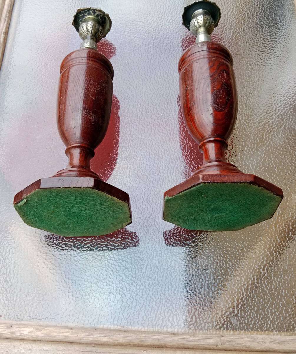 Pair of early 20th century turned wood and silvery candlesticks