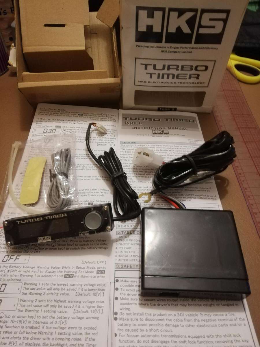 HKS Turbo Timer for automatic turbo cooling and vehicle shutdown.