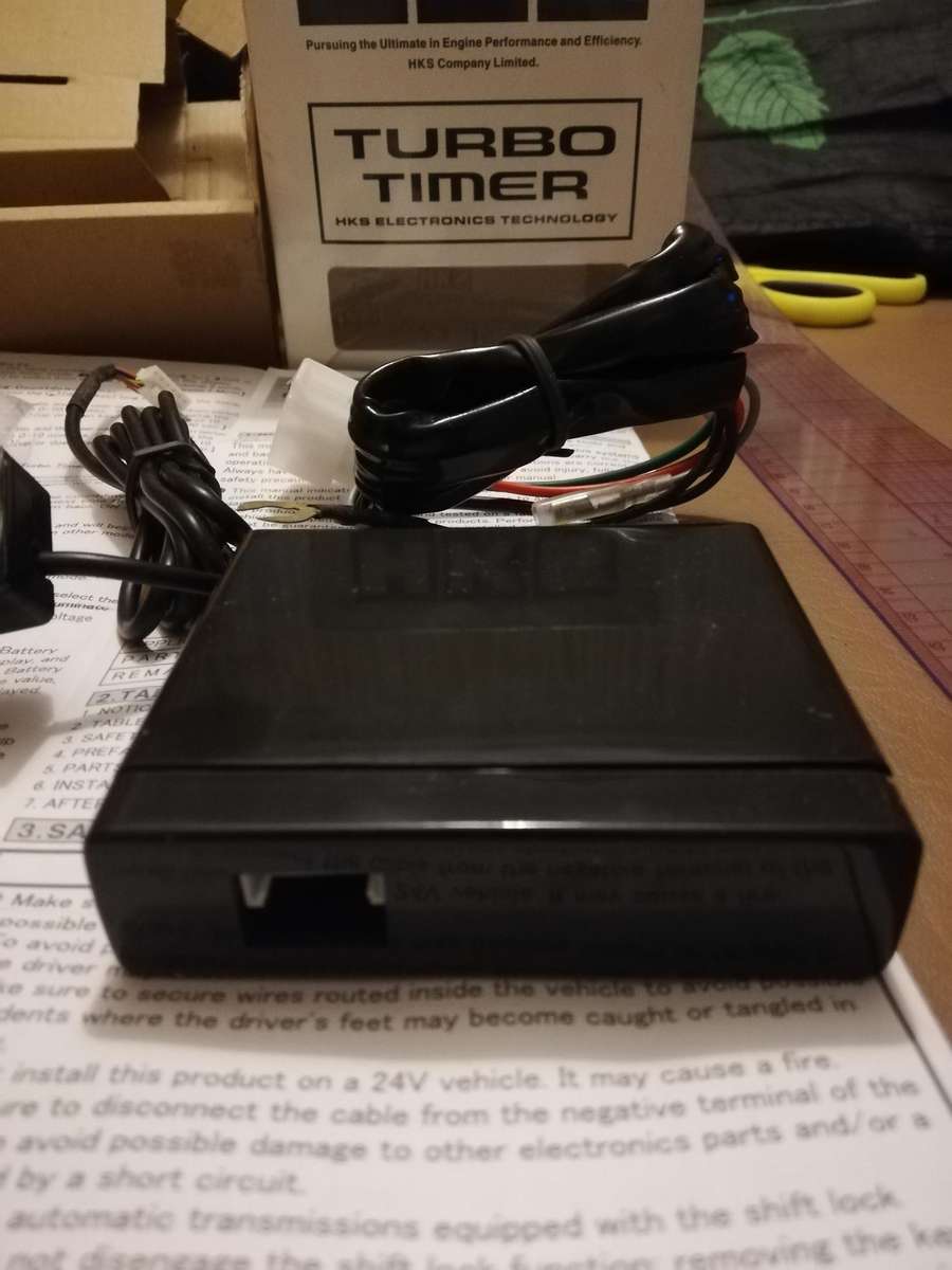 HKS Turbo Timer for automatic turbo cooling and vehicle shutdown.