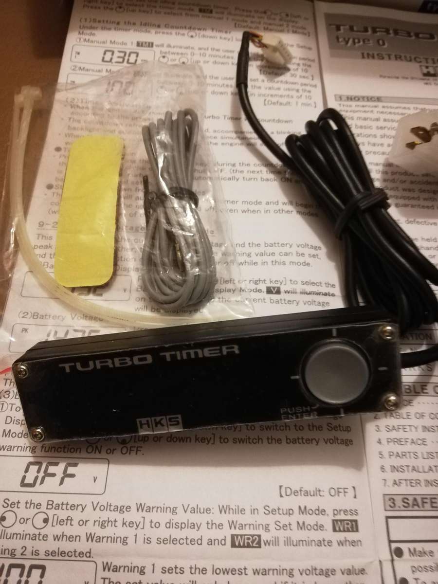 HKS Turbo Timer for automatic turbo cooling and vehicle shutdown.