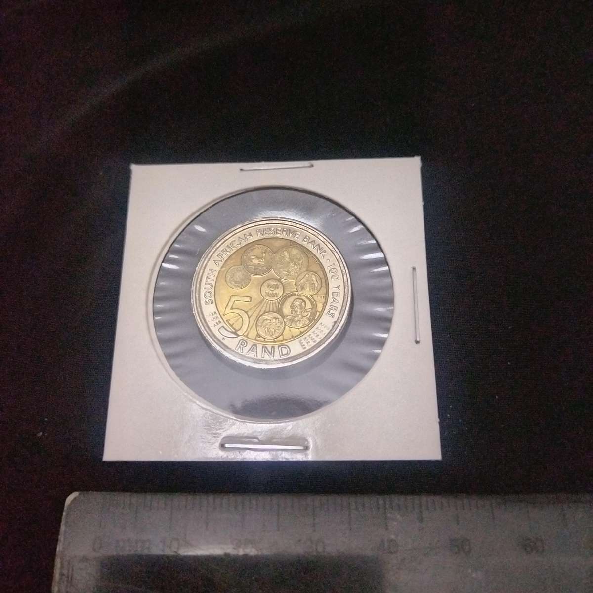 A lot of 9 commemorative R5 coins. Includes a '94 presidential inauguration coin