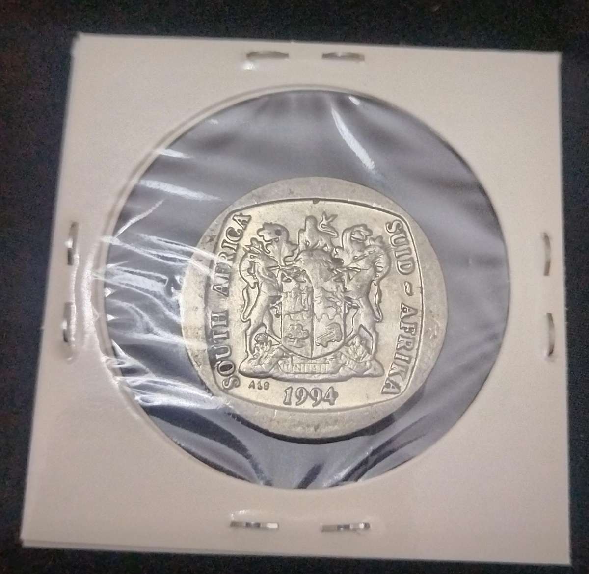 A lot of 9 commemorative R5 coins. Includes a '94 presidential inauguration coin