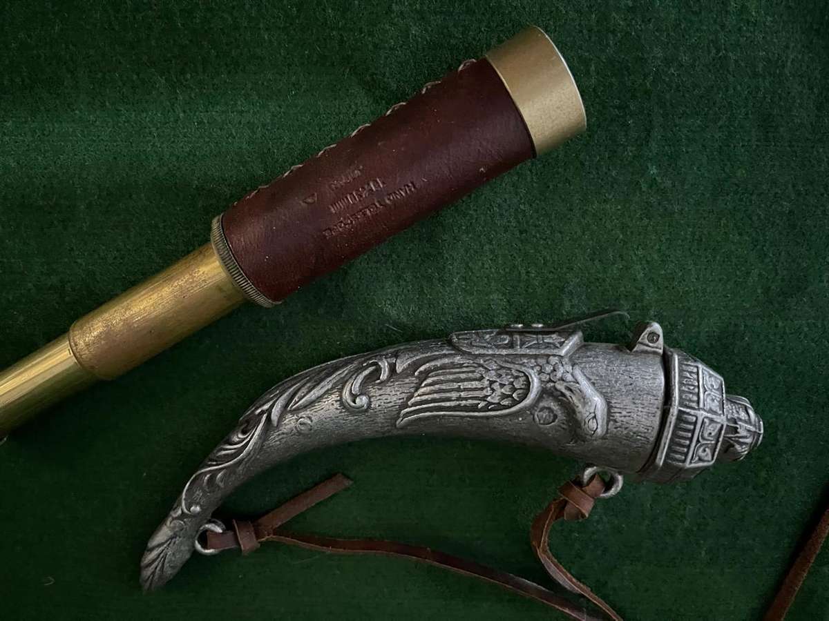 Bar Display items : beautiful vintage style display items - lead powder horn and old scope