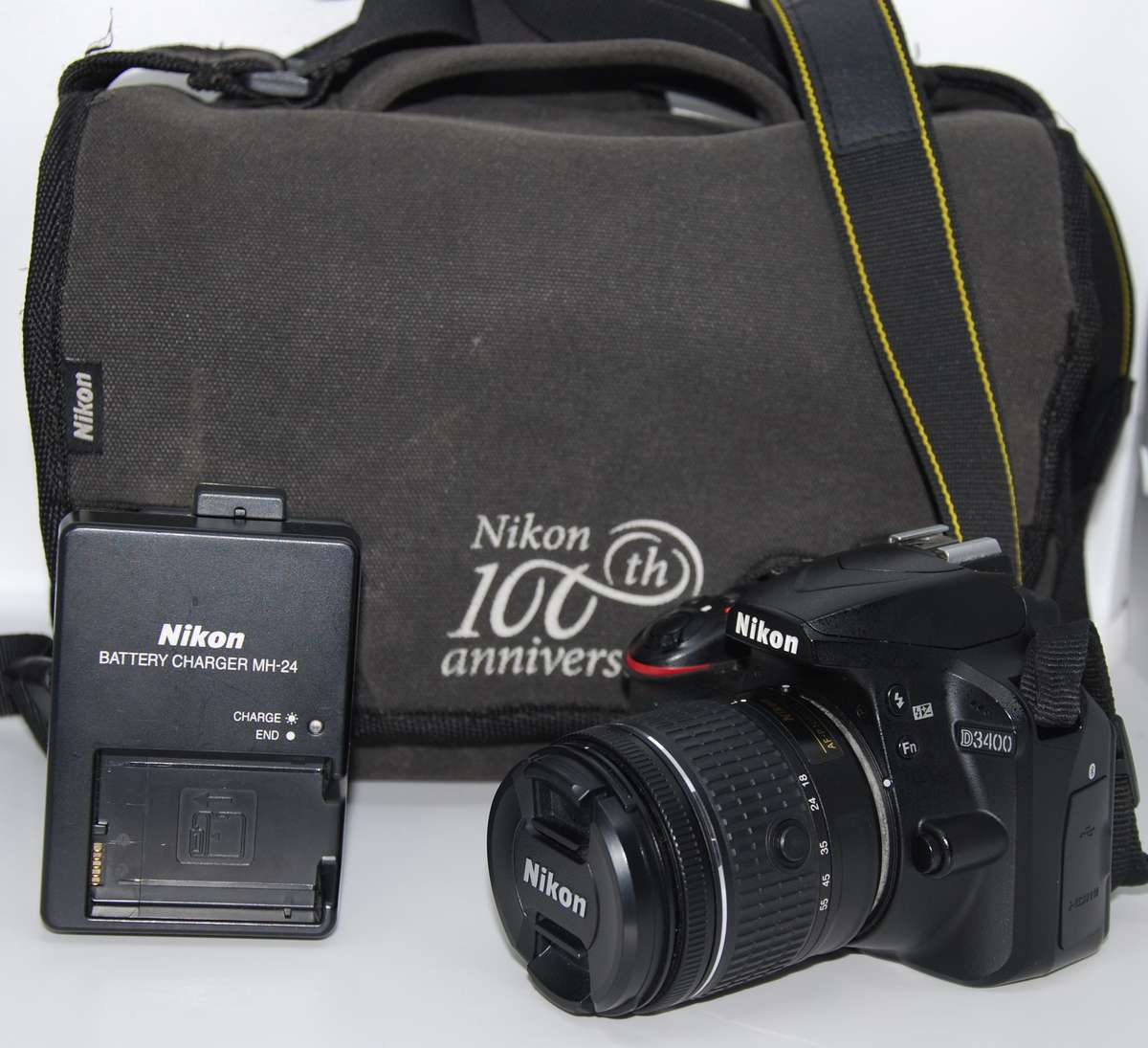 Nikon D3400 24MP DSLR ,FULL HD MOVIES with AF-P 18-55mm Lens ,VERY GOOD CONDITION. LOW SHUTTER(2050)