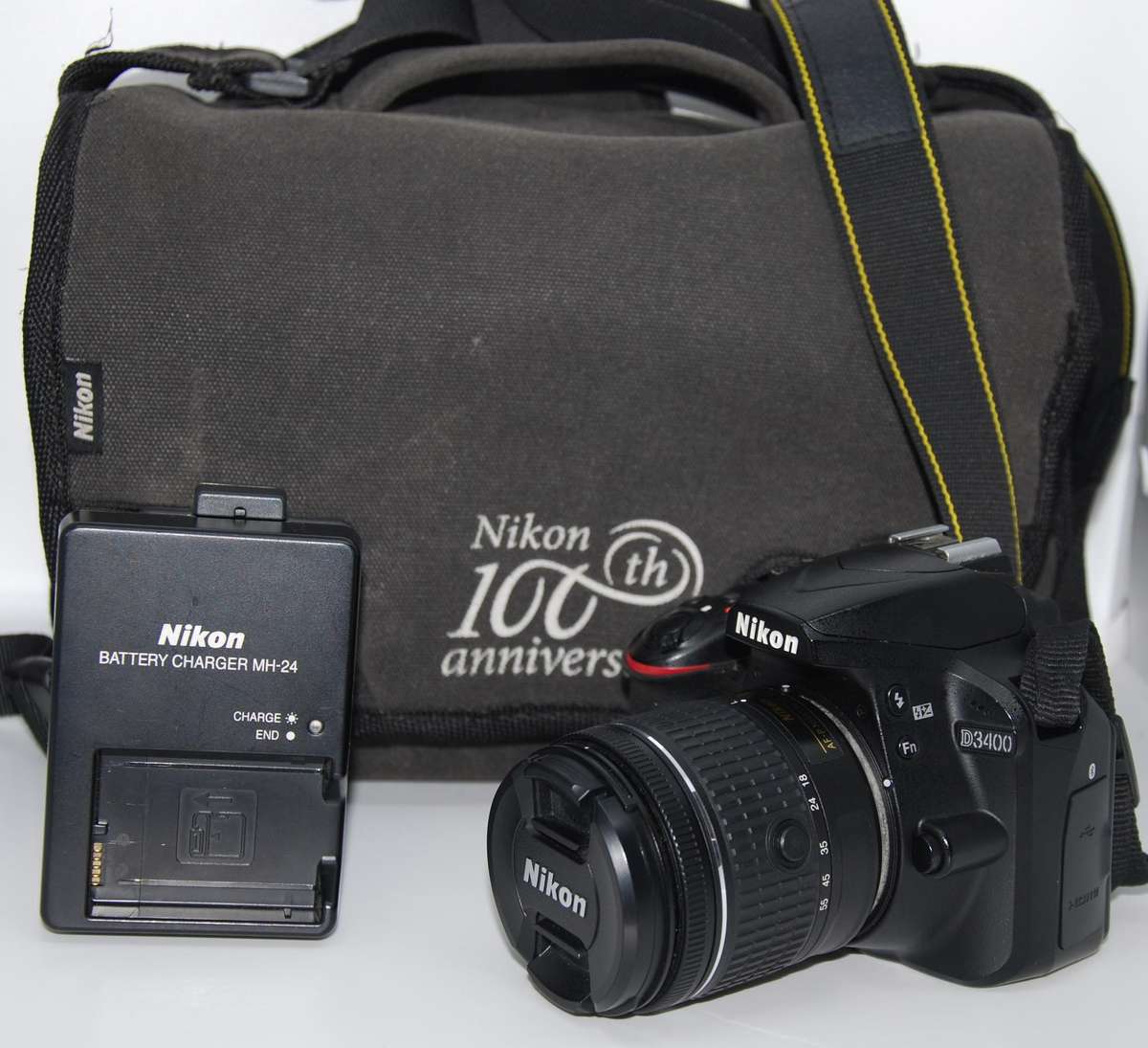 Nikon D3400 24MP DSLR with AF-P 18-55mm Zoom  Lens , CHARGER And NIKON BAG, Low Shutter count