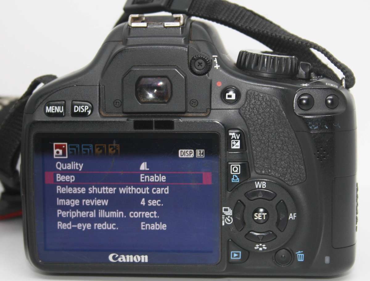 Canon EOS 550D  18 MP CMOS APS-C Digital SLR Camera with 3.0-Inch LCD and EF-S 18-55mm f/3.5-5.6 III