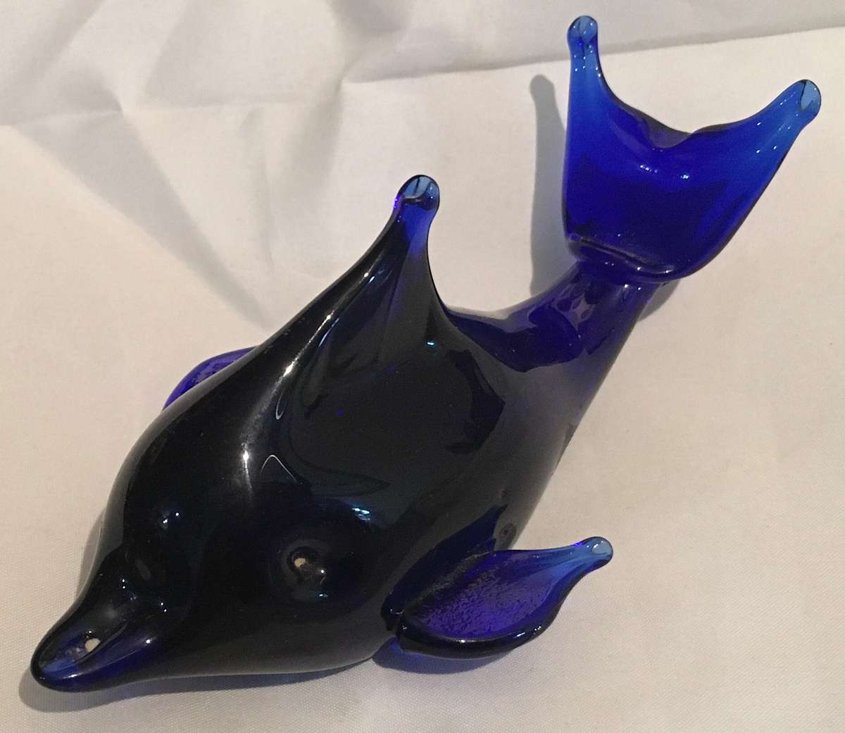 Cobalt blue dolphin paperweight