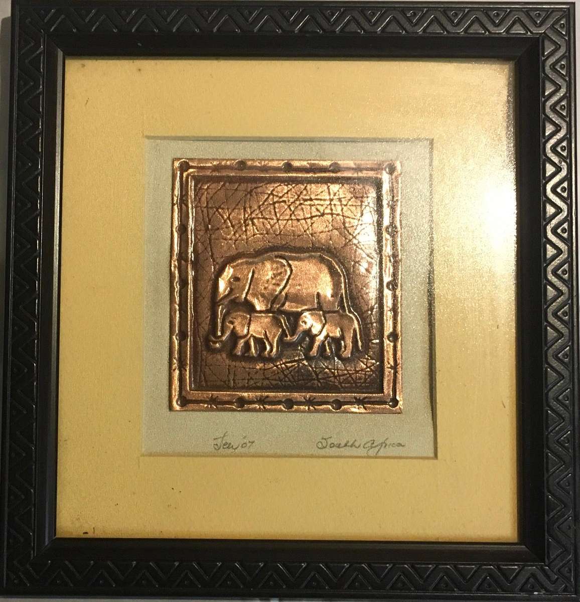 Elephants: mother and babies on a copper plate.  Framed portrait.