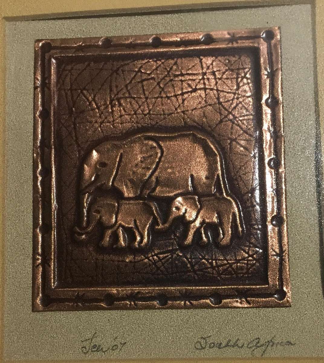 Elephants: mother and babies on a copper plate.  Framed portrait.