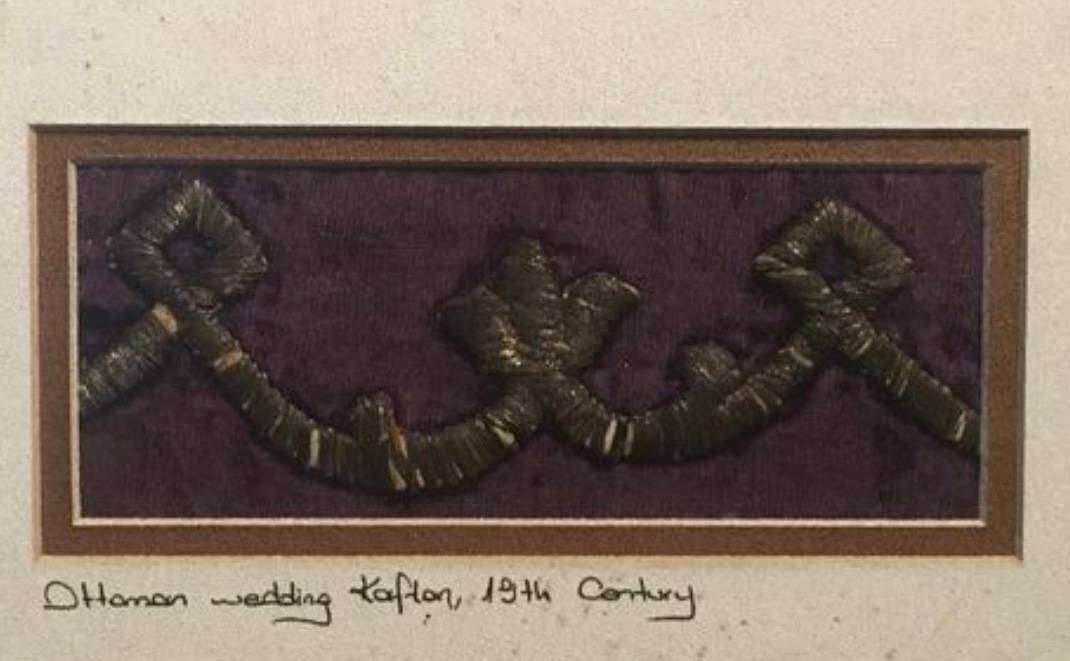 Framed 19th century wedding kaftan. 27,5 x 18,5cm