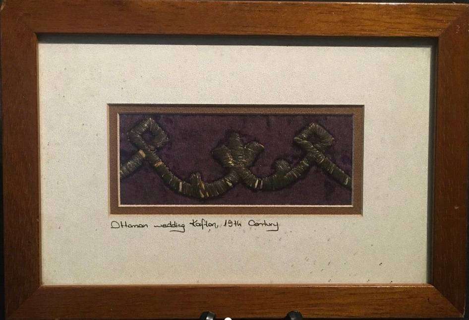 Framed 19th century wedding kaftan. 27,5 x 18,5cm