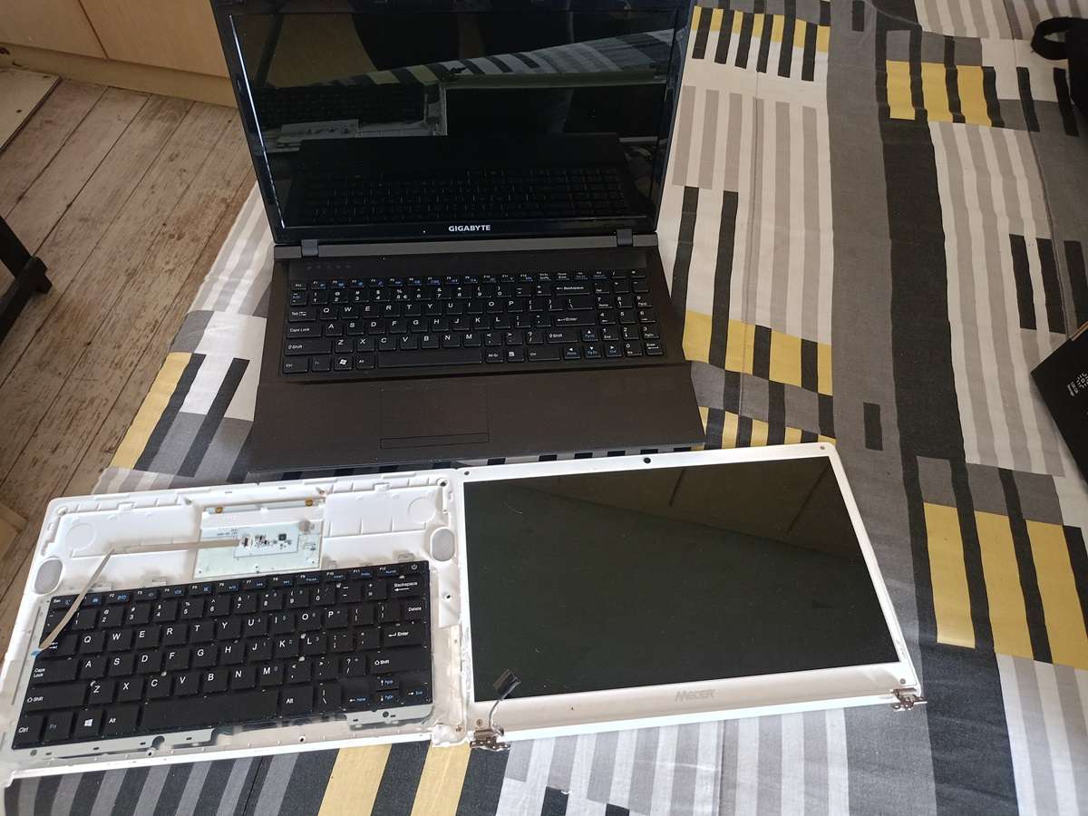 two non working laptops and parts