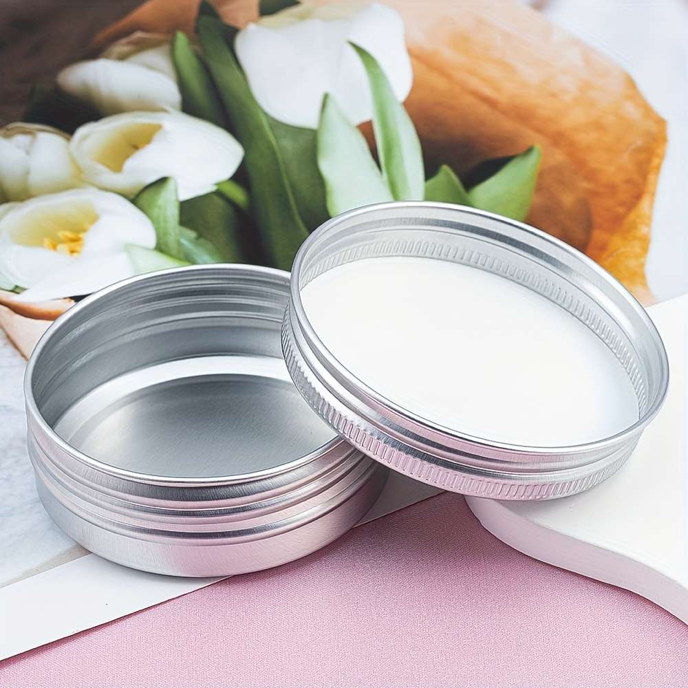 A Circular Aluminum Box With A Threaded Rotating Sealed Lid