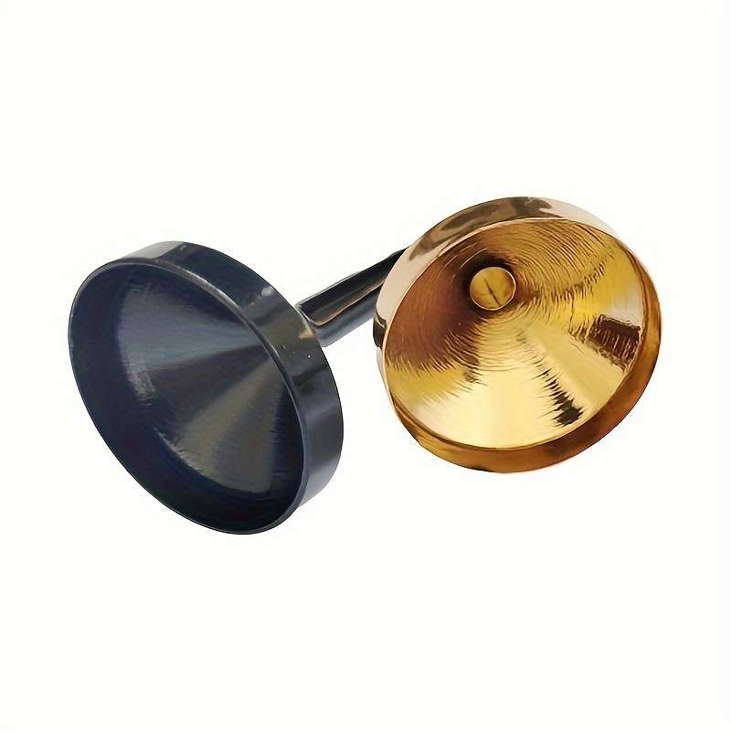 A Set Of Small Golden Funnels Specially Designed For Perfumes And Essential Oils