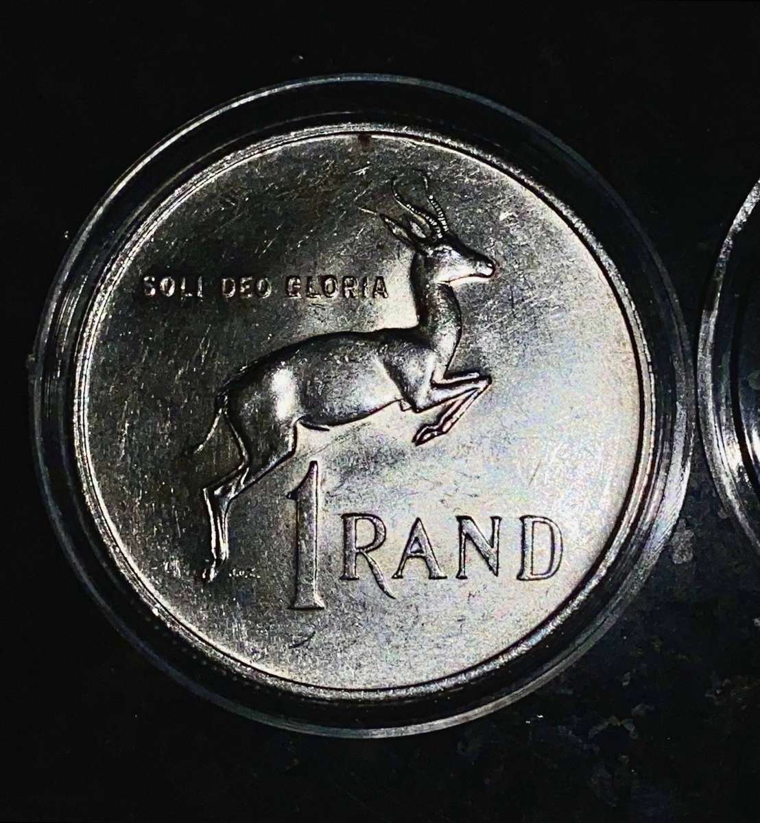 South Africa. Silver R1 -- 1967 Afrikaans good condition in capsule