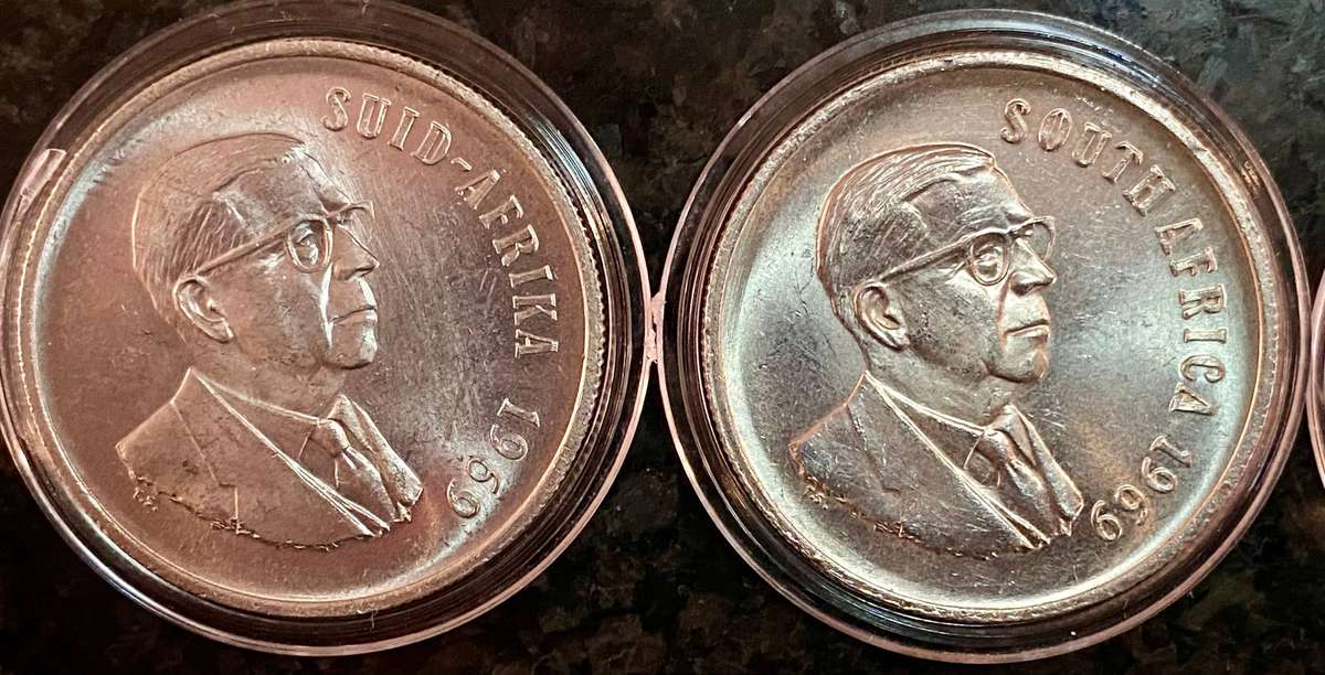 South Africa. Silver R1 -- 1969 Afrikaans & English good condition in capsule (1 bid takes all)