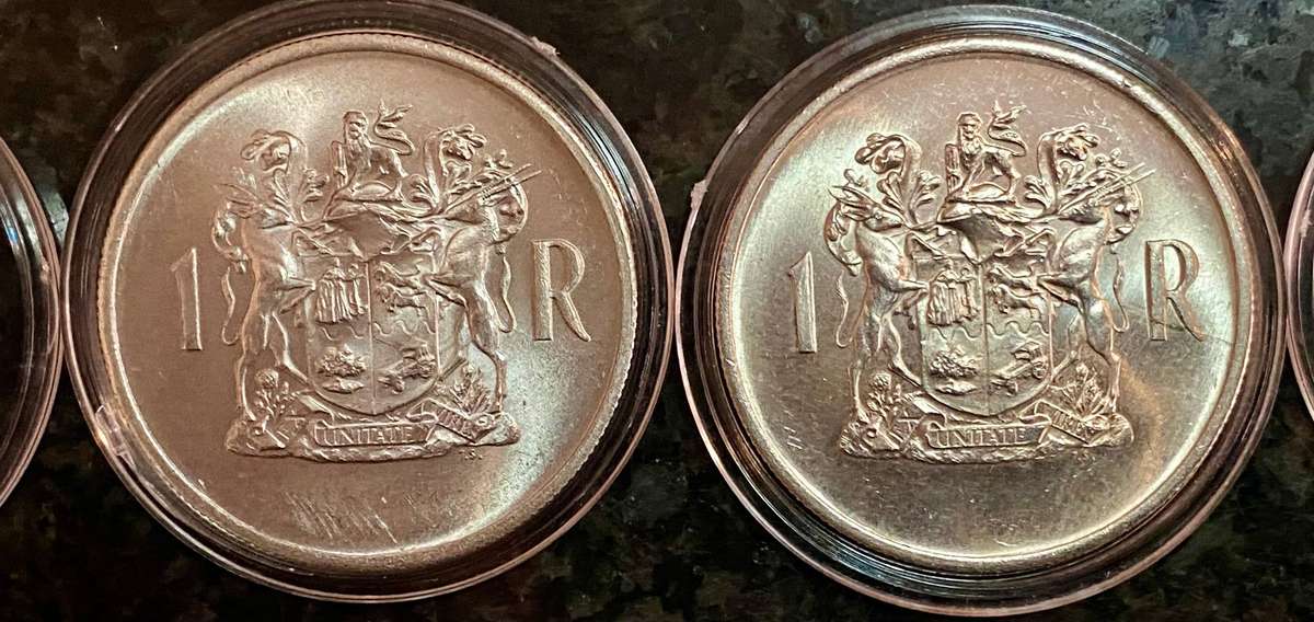 South Africa. Silver R1 -- 1969 Afrikaans & English good condition in capsule (1 bid takes all)