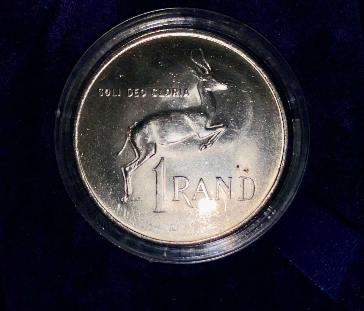 South Africa. Silver R1 -- 1967 Afrikaans good condition in capsule & blue box