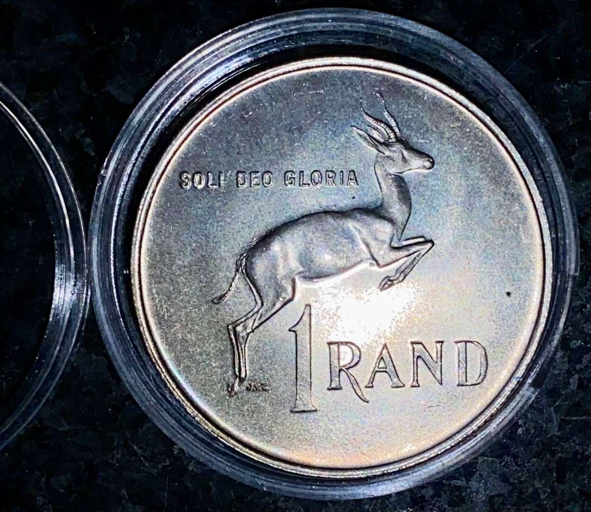 South Africa. Silver R1 -- 1967 Afrikaans good condition in capsule