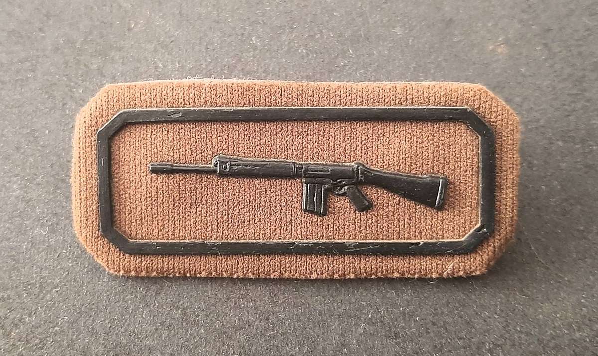 Border War: 1980s SADF Nutria Rubberized 'Tupperware' Marksmanship Breast Badge w/ Pins.