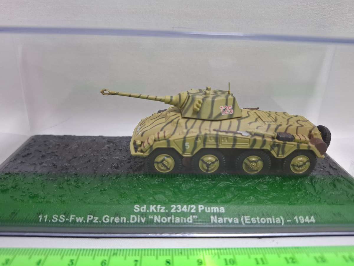 Diecast Model Of The Sd.Kfz. 234/2 Puma, a German armored car(Tank) from World War II.
