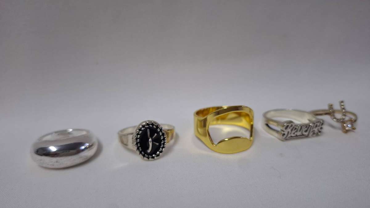 Lot 22A - A Stunning Collection of Five Gold and Silver Plated Rings