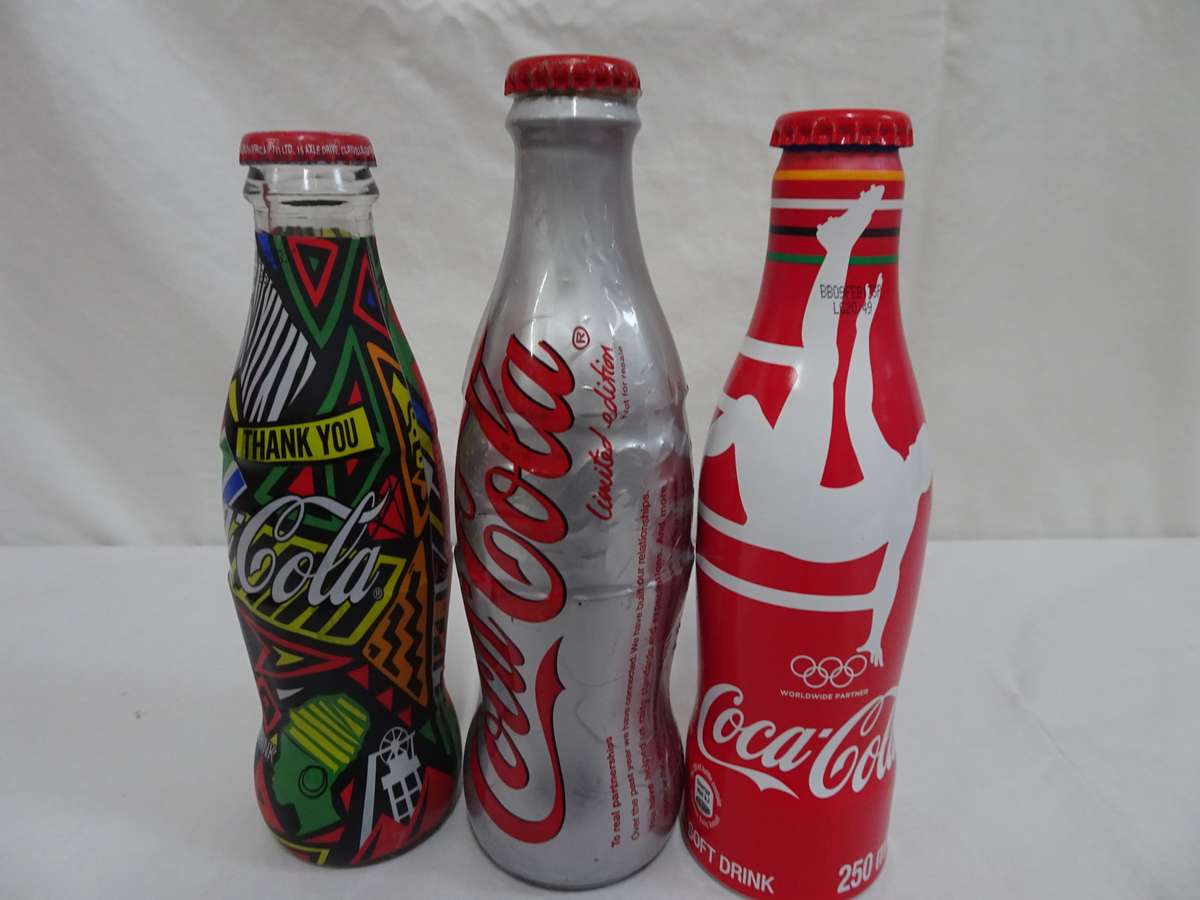 Collection Of 8x Coco Cola Glass Bottles +One Coca-Cola FIFA World Cup Russia 2018 Soccer Metal Ball