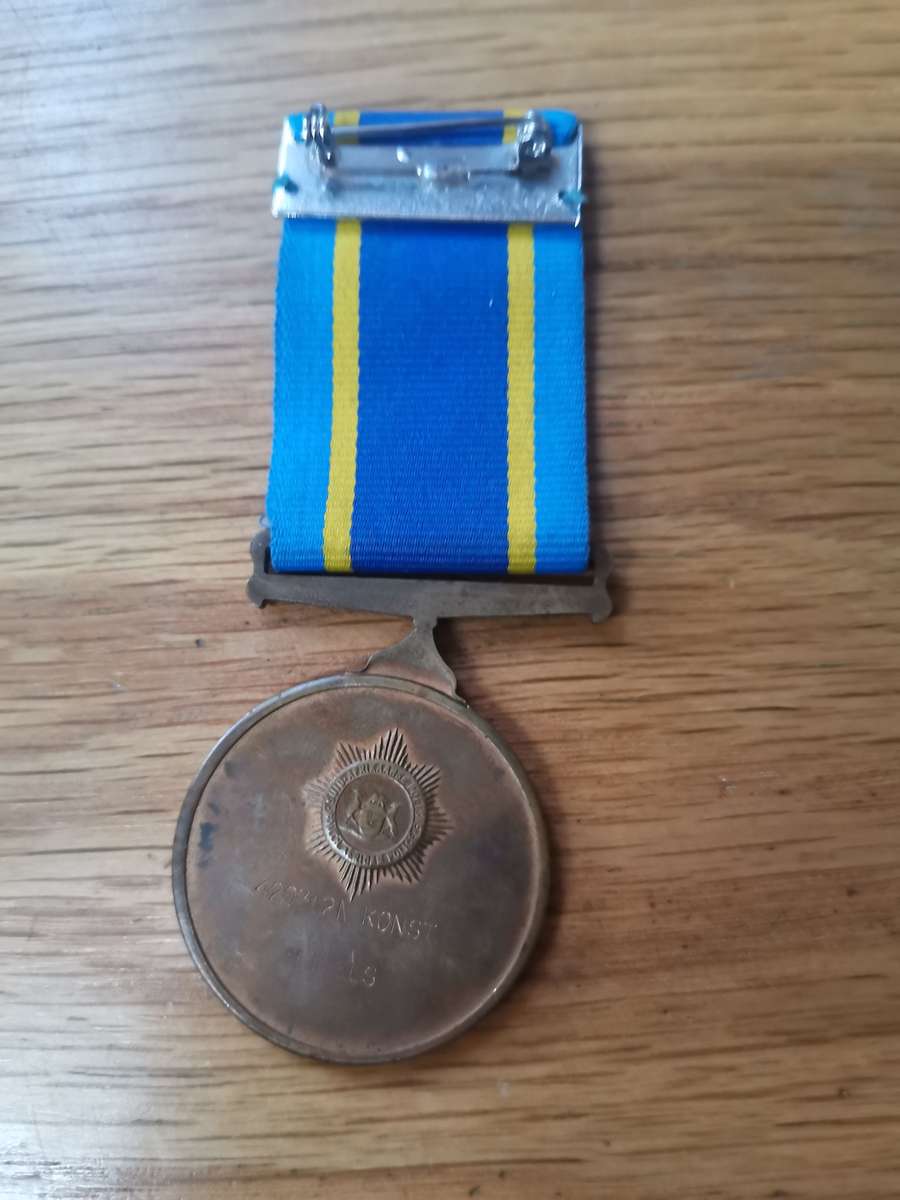 South African Police  SA47. 75th Anniversary Medal issued to 420312N Konst H L Els -Good Condition