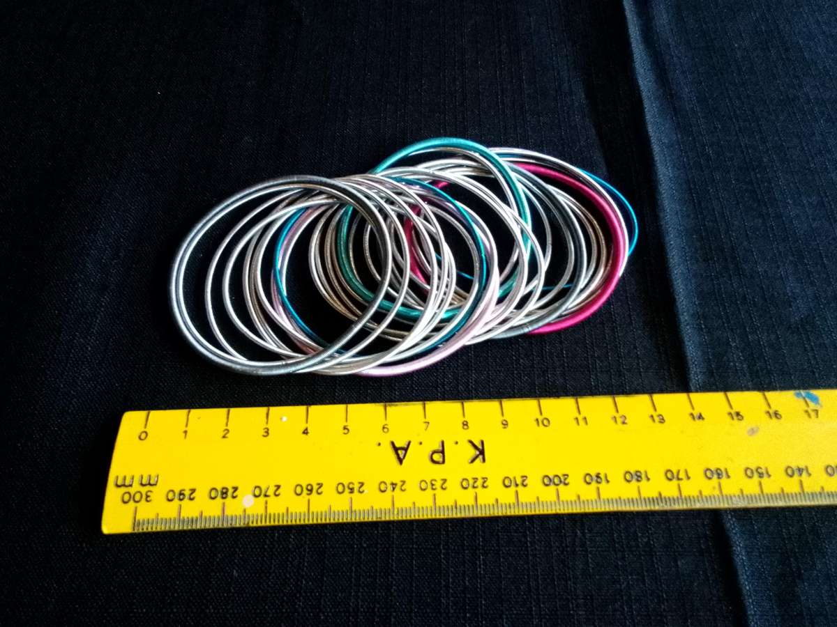 Stunning TwentyFive Silver, Pink And Blue Metal Slinky Spring Arm Bracelets   - Excellent Condition