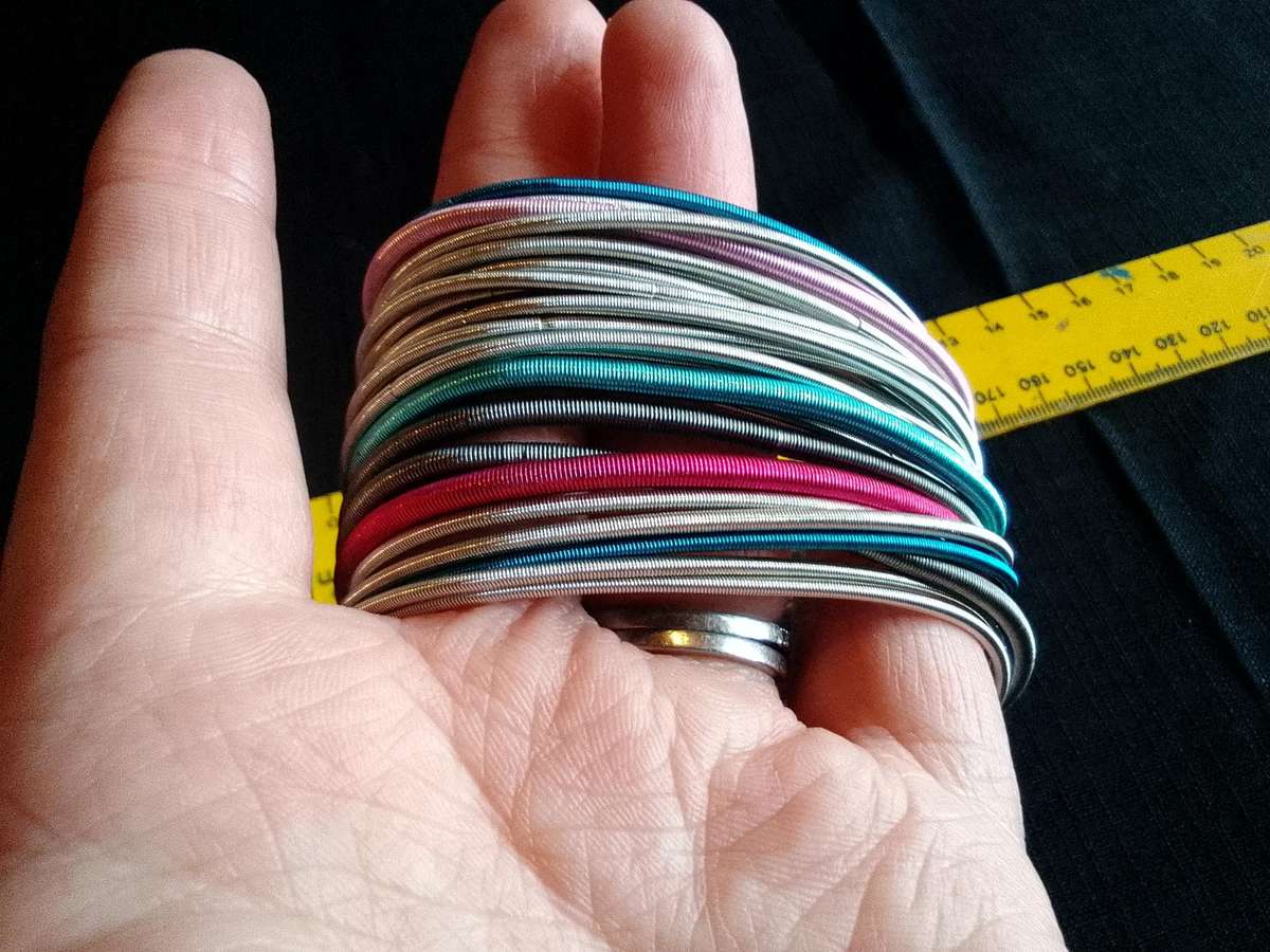 Stunning TwentyFive Silver, Pink And Blue Metal Slinky Spring Arm Bracelets   - Excellent Condition