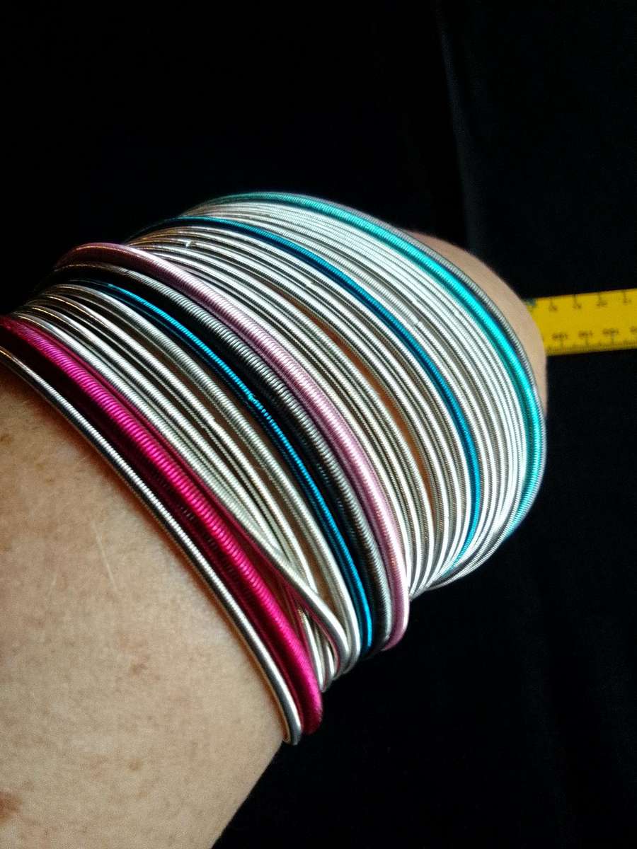 Stunning TwentyFive Silver, Pink And Blue Metal Slinky Spring Arm Bracelets   - Excellent Condition