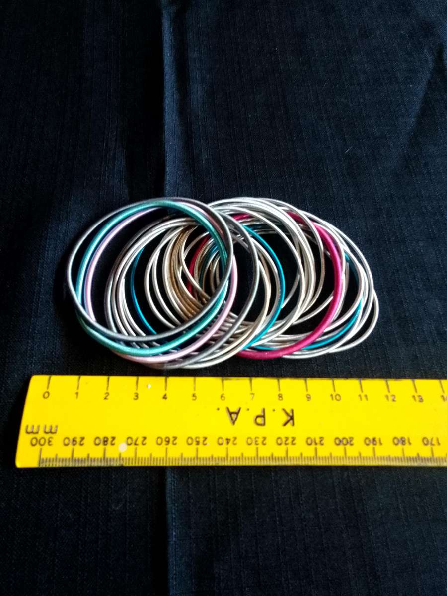 Stunning TwentyFive Silver, Pink And Blue Metal Slinky Spring Arm Bracelets   - Excellent Condition