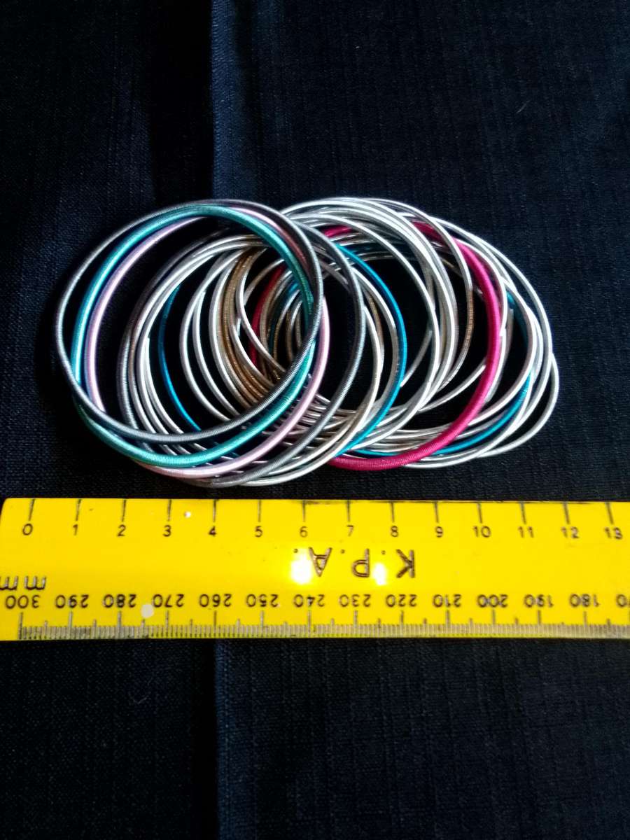Stunning TwentyFive Silver, Pink And Blue Metal Slinky Spring Arm Bracelets   - Excellent Condition