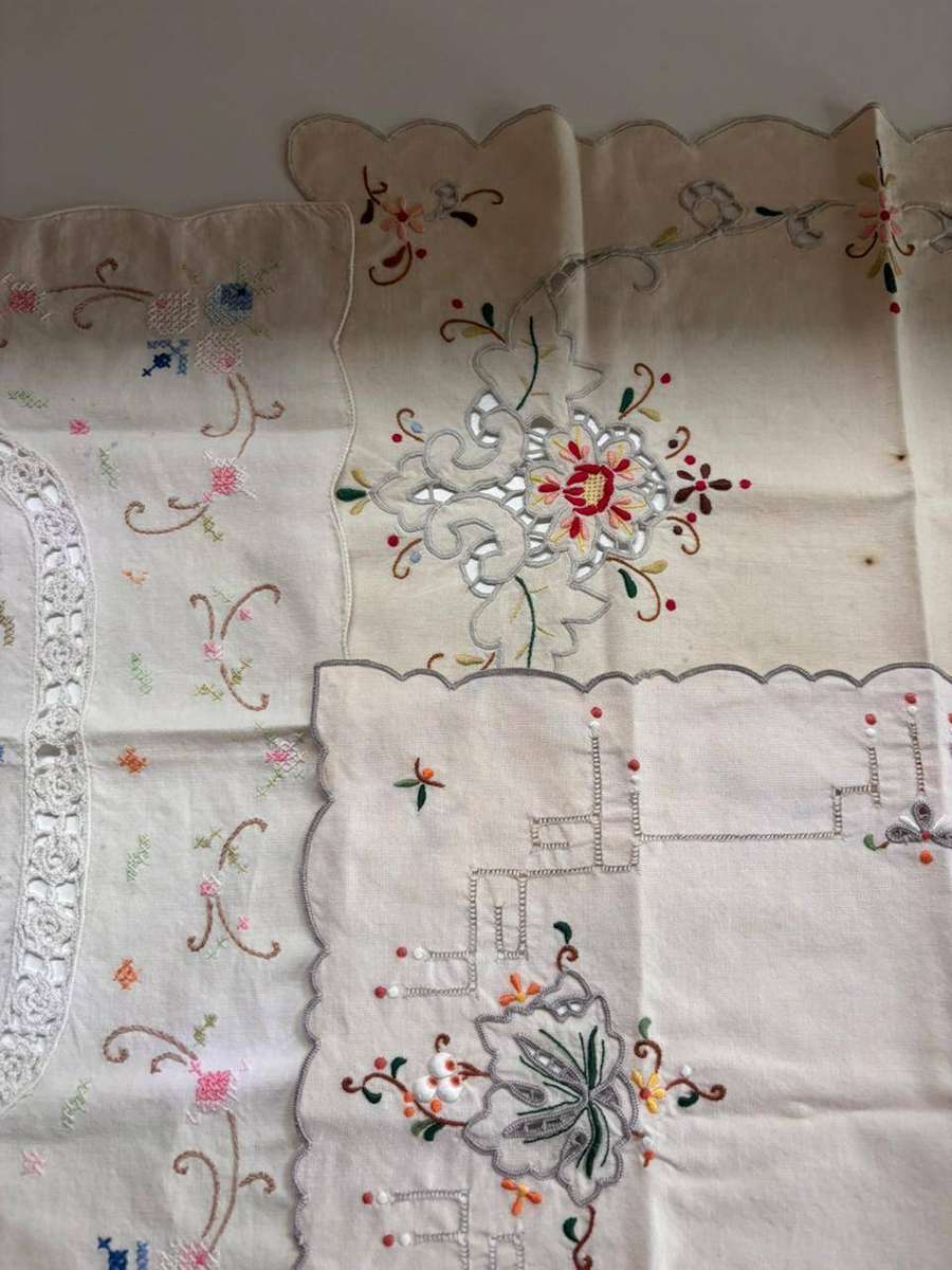 Collection of Vintage Embroidered Doilies & Napkins Featuring Various hand-Stitched Floral Pattern