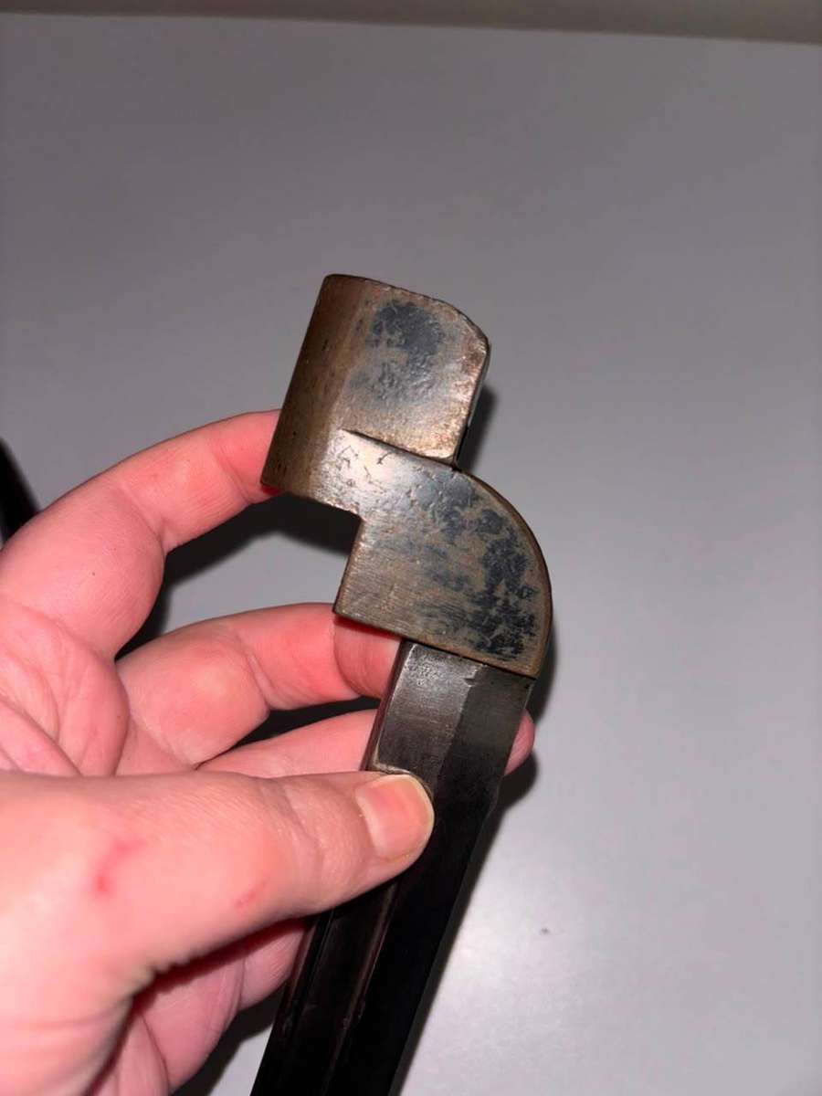 9 MK 1 Bayonet Designed for 303 Rifle, Featuring a Blade and Scabbard