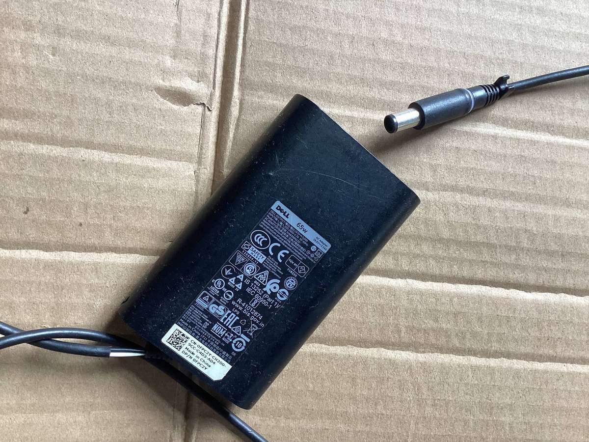 Dell original 65 watt 19.5V  3.34 A  laptop charger