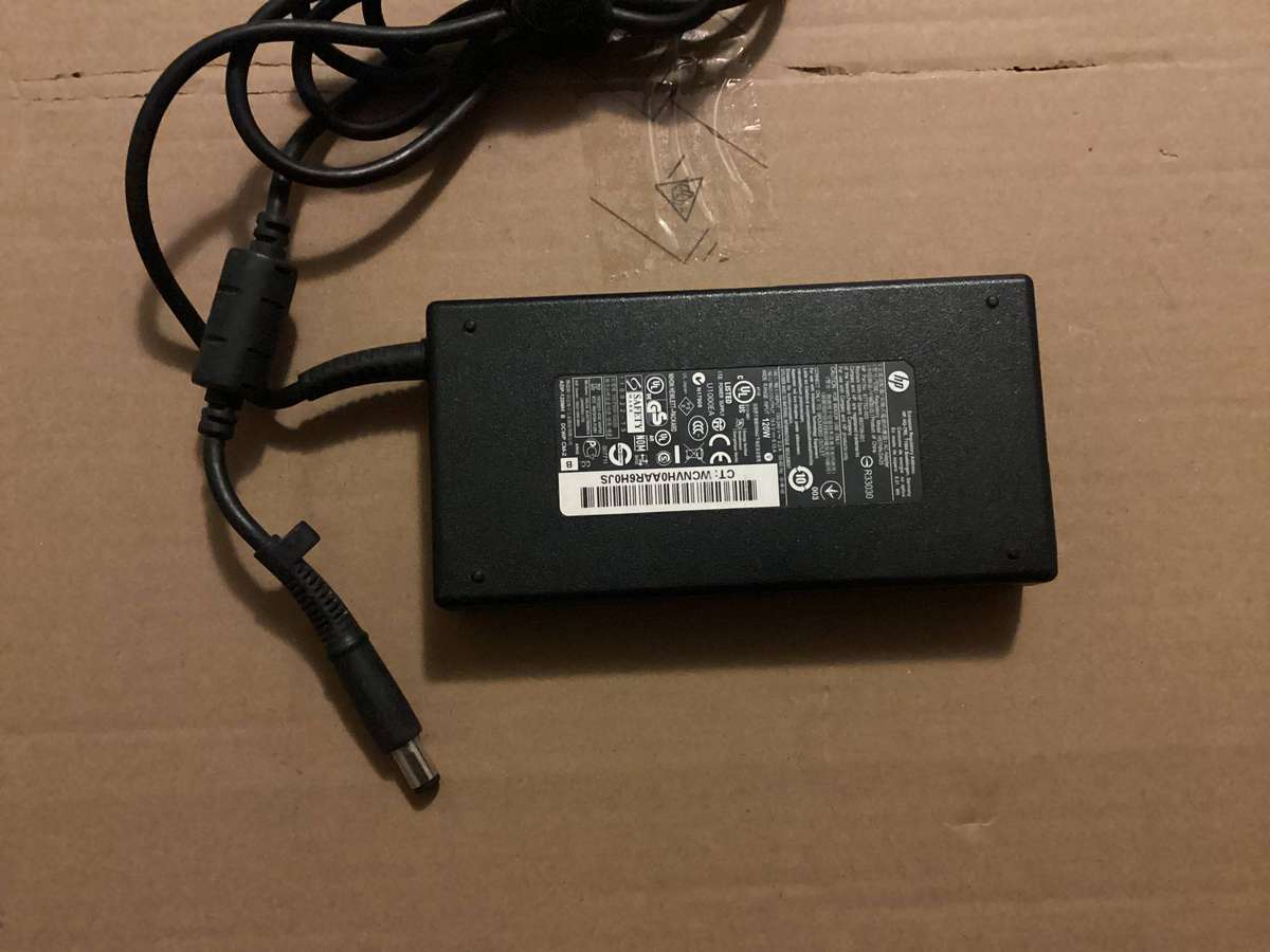 Hp original 19v 6.1 120 laptop/ docking charger