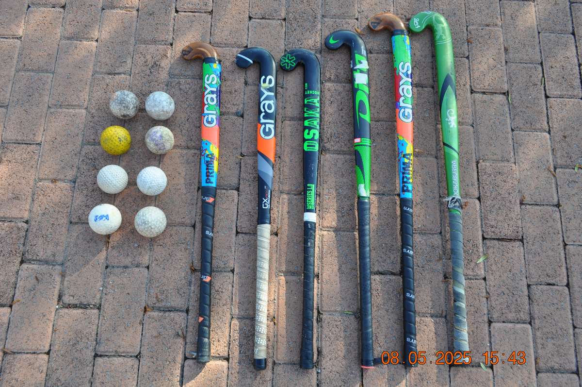Hockey Sticks and Practice Balls Take Them All