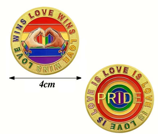 Human Rights day - 21 Mar: Encapsulated Love and Pride Medallion in transparent display case.