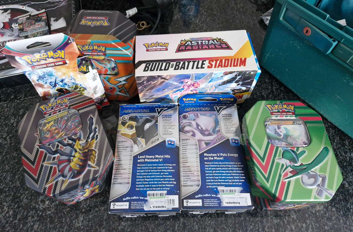 GENUINE POKEMON CARDS - AS NEW STILL IN THEIR ORIGINAL CONTAINERS